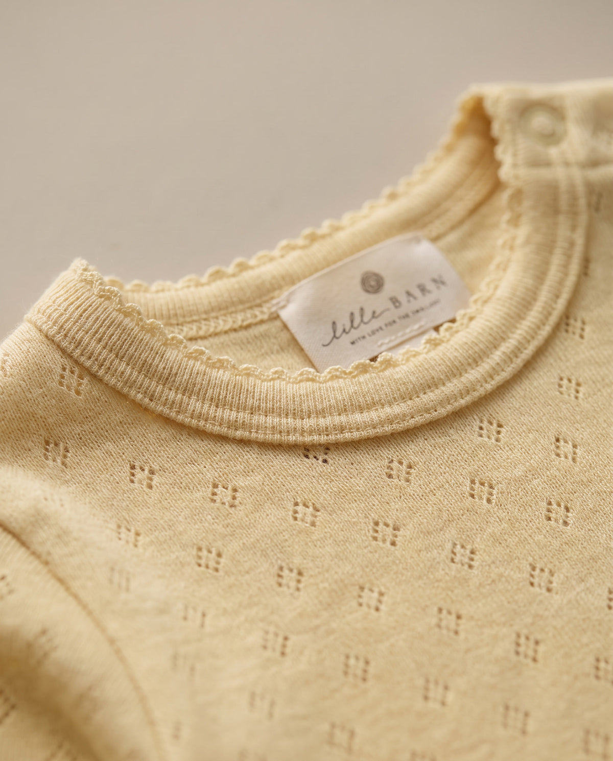 Woll-Strampler mit langen Ärmeln Pointelle – Merinowolle – Dusty Yellow