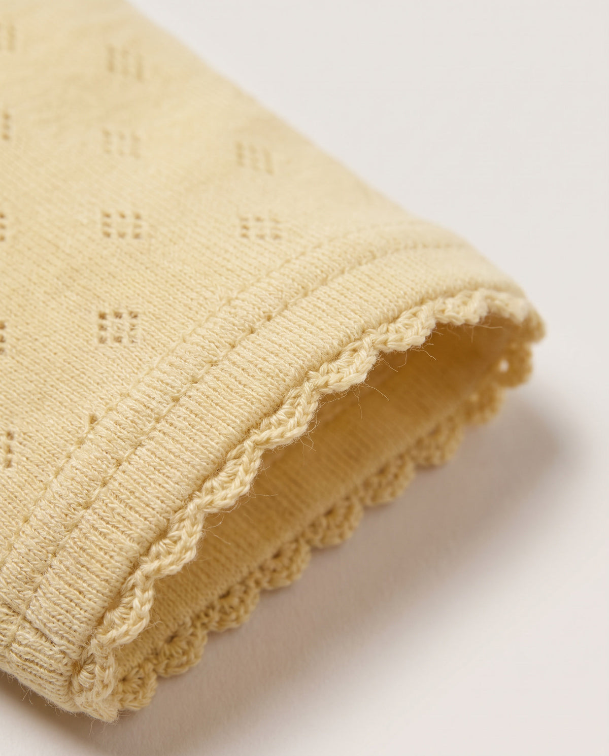 Woll-Strampler mit langen Ärmeln Pointelle – Merinowolle – Dusty Yellow