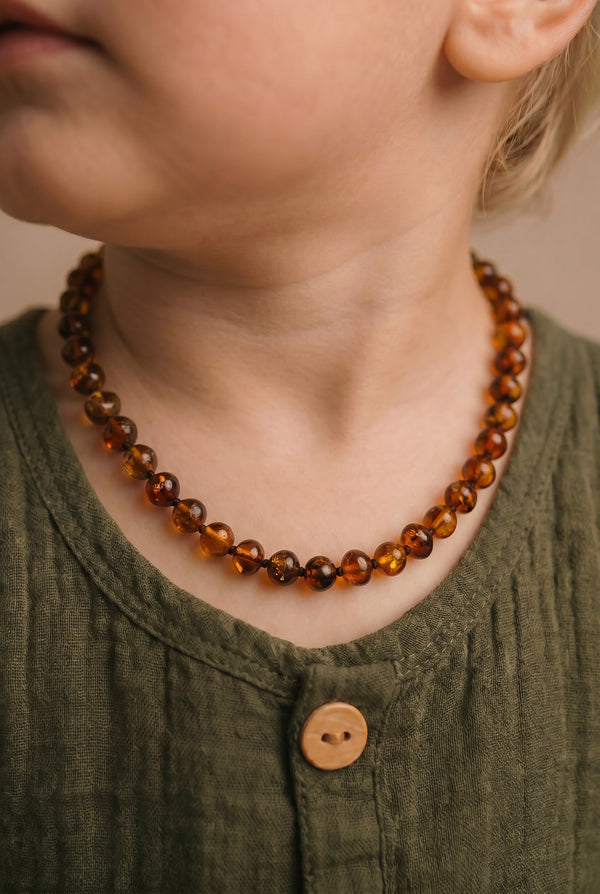 Baby/Kind – Bernsteinkette – runde Perlen – 33cm - cognac