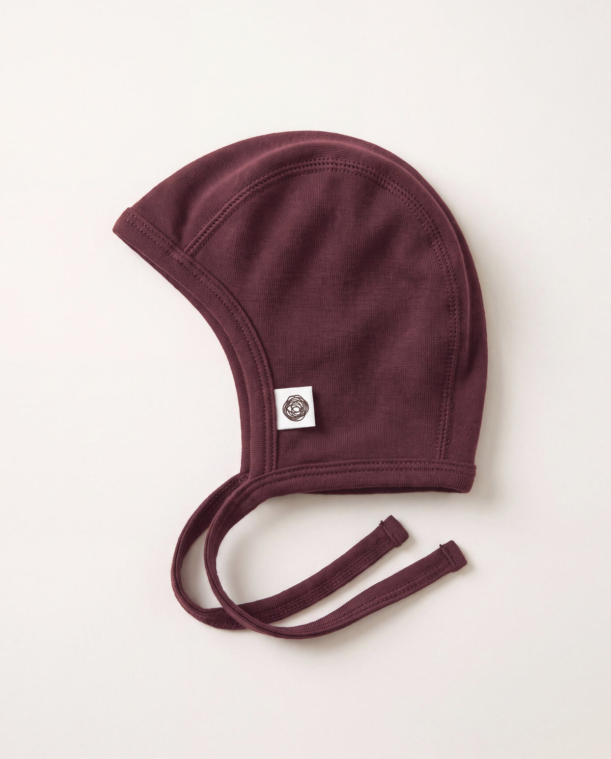 Babymütze mit Schleife aus Wolle – Merinowolle – Red Mahogany