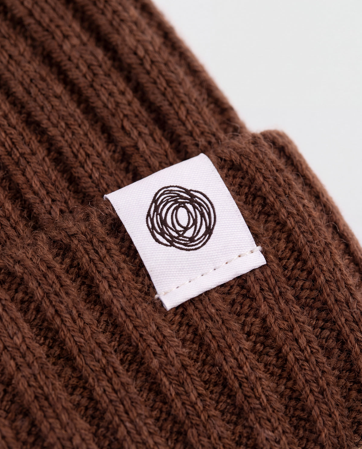 Gestrickte Baby Mütze aus Merinowolle - Carob