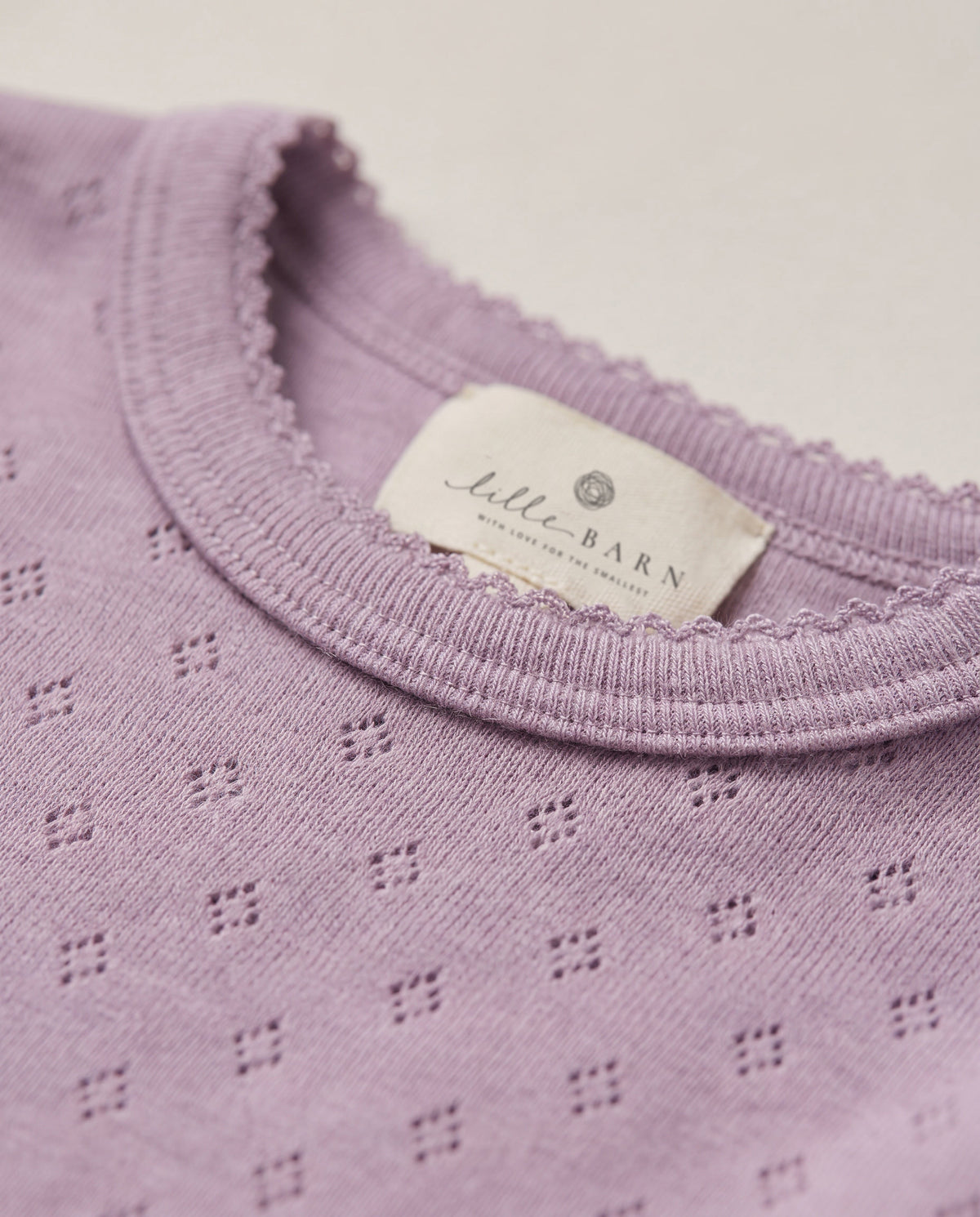 Woll-Strampler mit kurzen Ärmeln Pointelle – Merinowolle – Lavender Frost
