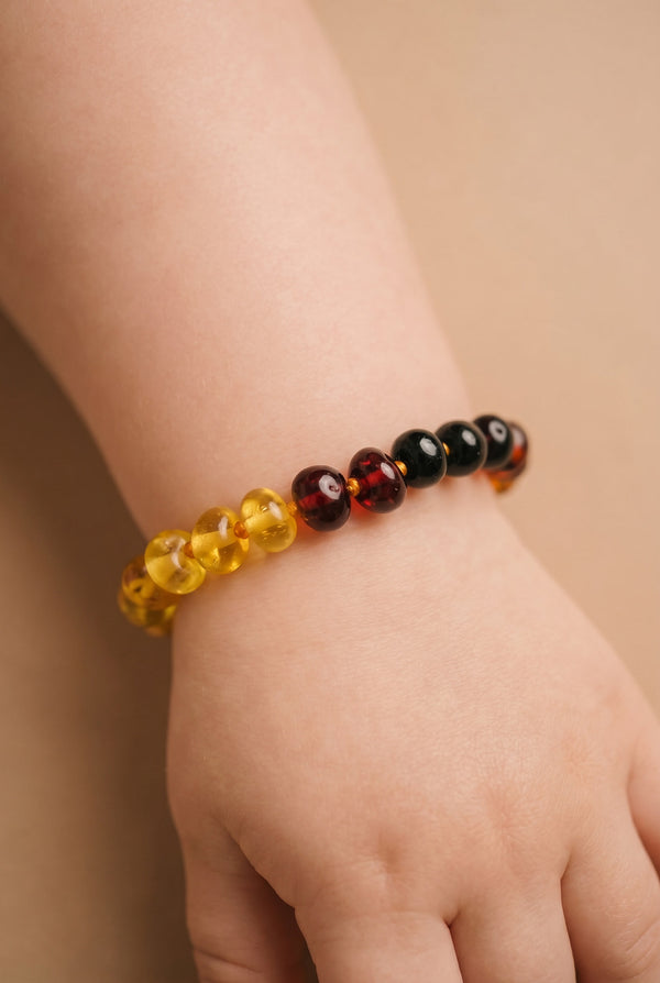 Baby/Kind - Bernsteinarmband - Regenbogen - runde Steine ​​- 14cm