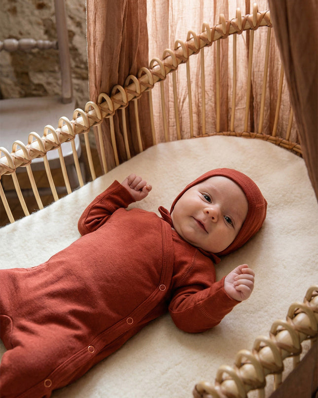 Playsuit / Strampler aus Wolle – Merinowolle